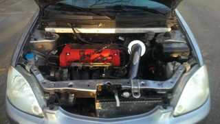 Illustration for article titled When Good Hybrids Go Bad, A 2000 Honda Insight With K20 Swap